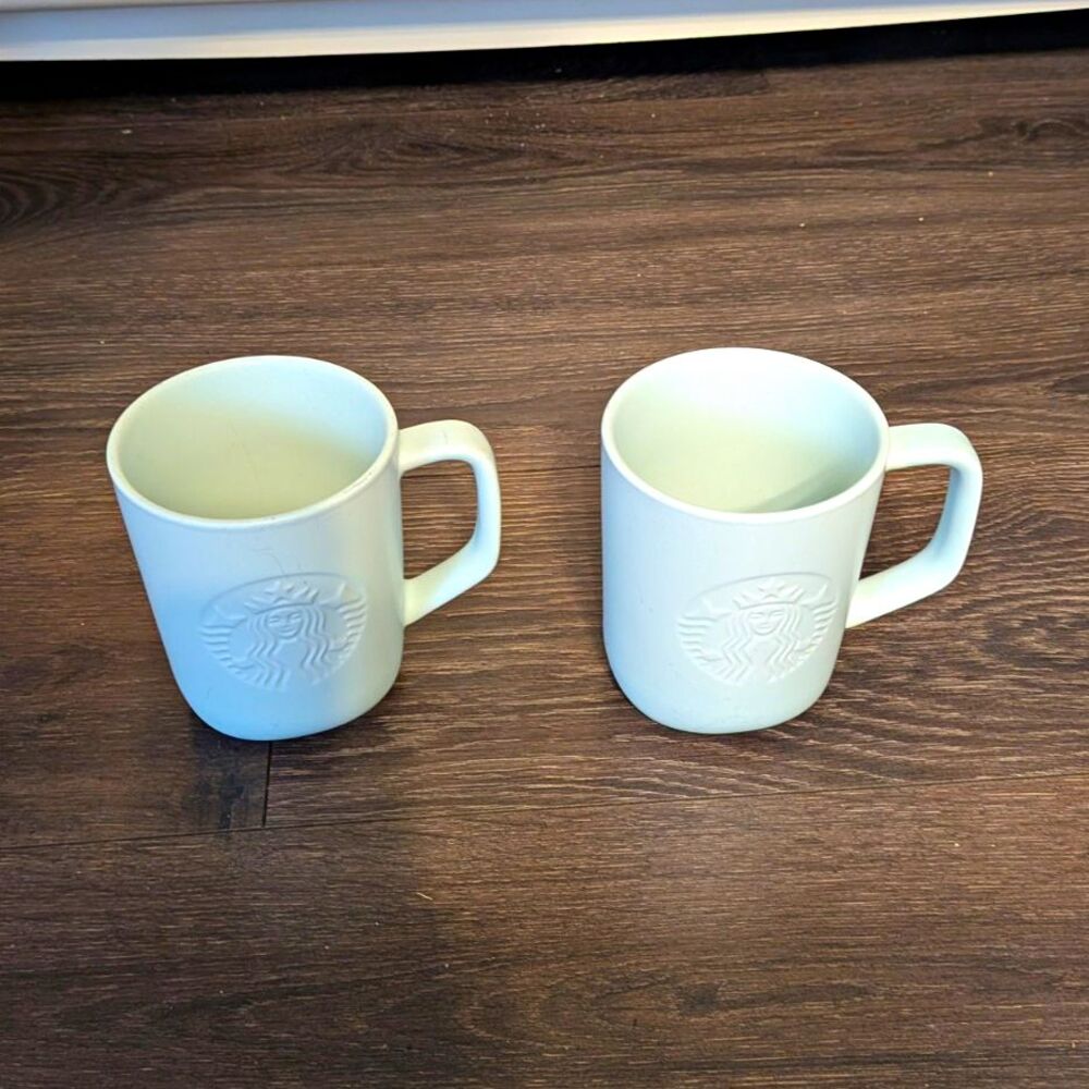 Starbucks White Embossed Siren Logo Coffee & Tea Mugs Set of 2